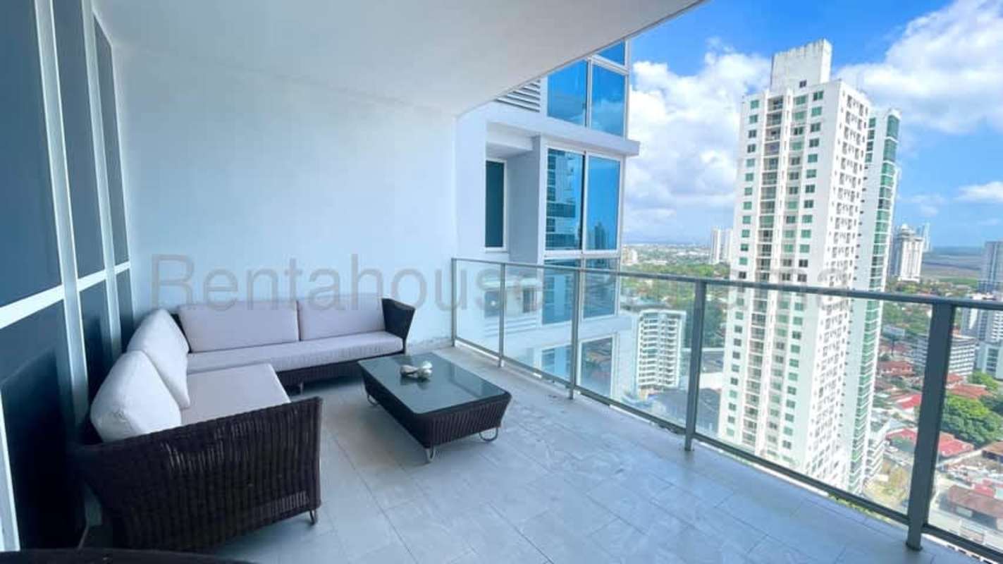 Modern high-rise tower facade with glass balconies in PH Quadrat San Francisco Panama