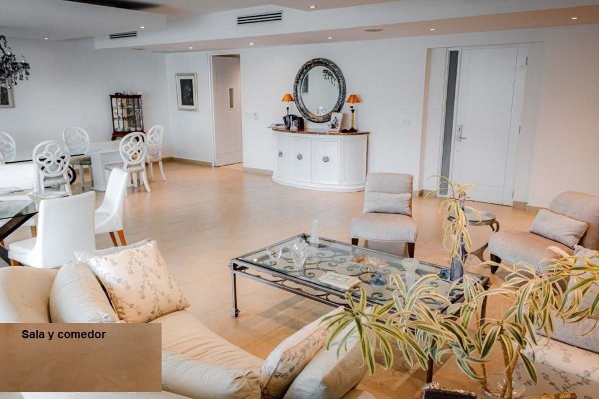 Luxury open plan living dining with panoramic windows at PH Aquamare Panama