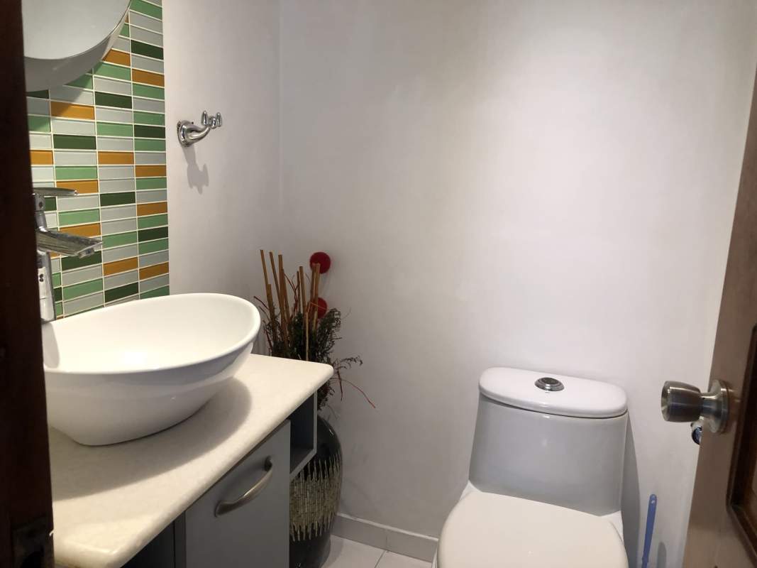 Dining area and living room with balcony, AC, ample light in PH Torres de San Francisco Panama City