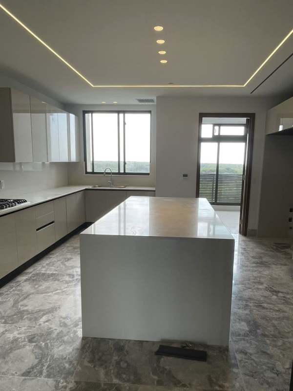 Luxury kitchen with quartz island and premium appliances in Empire Residences Santa María Panama