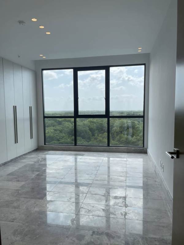Modern bathroom with marble walls, walk-in shower and premium fixtures at Empire Residences