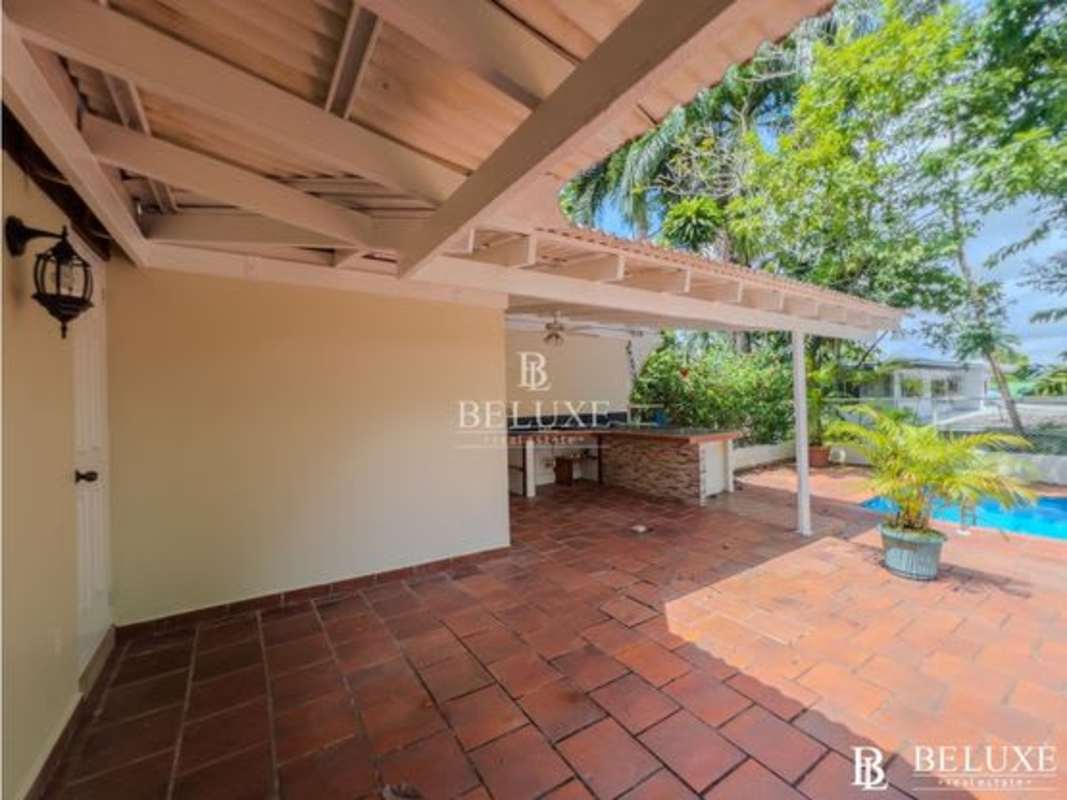 Private pool with terracotta patio lush landscaping home rental in Clayton Panama