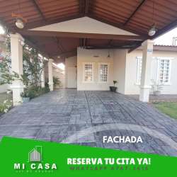 Living area with sofas, TV, large windows in rental house Penonomé Coclé Panama