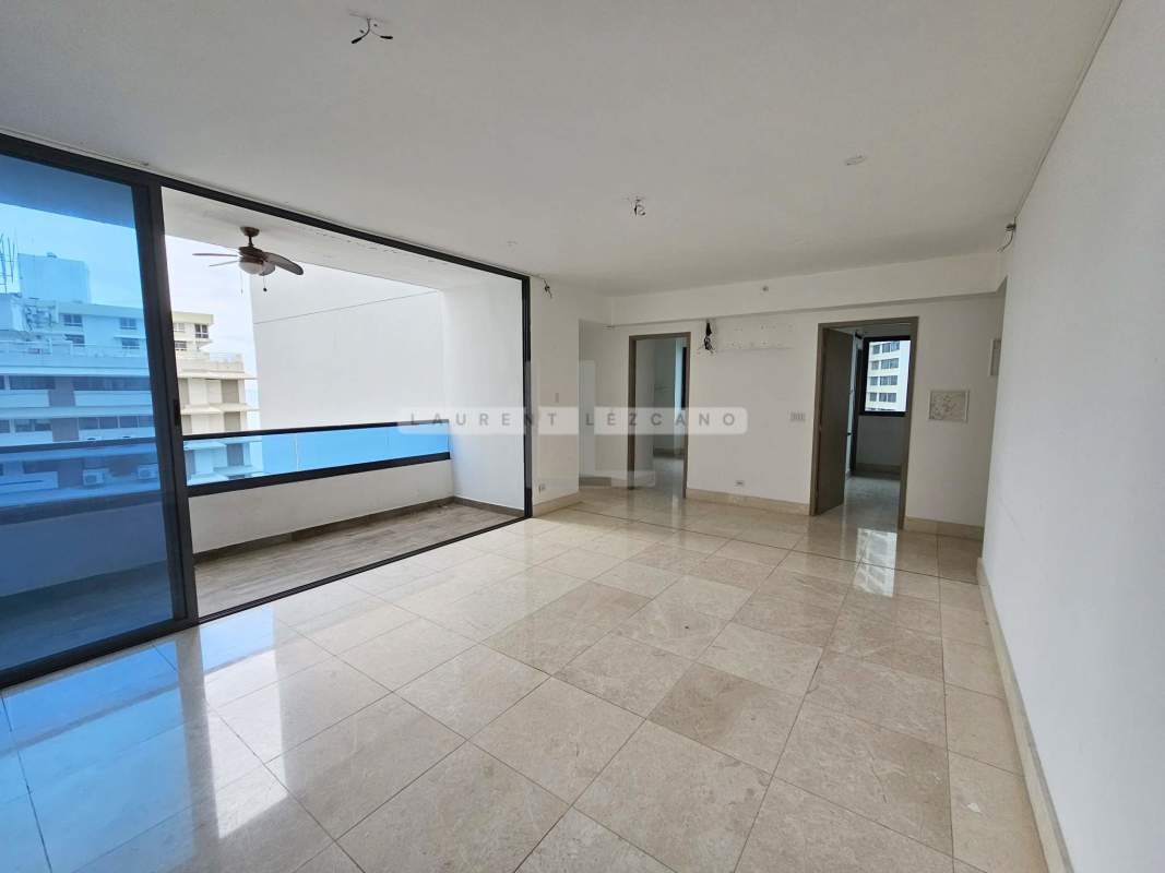 Spacious living dining room with access to balcony ocean view at PH Deluxe Residences Punta Paitilla Panama