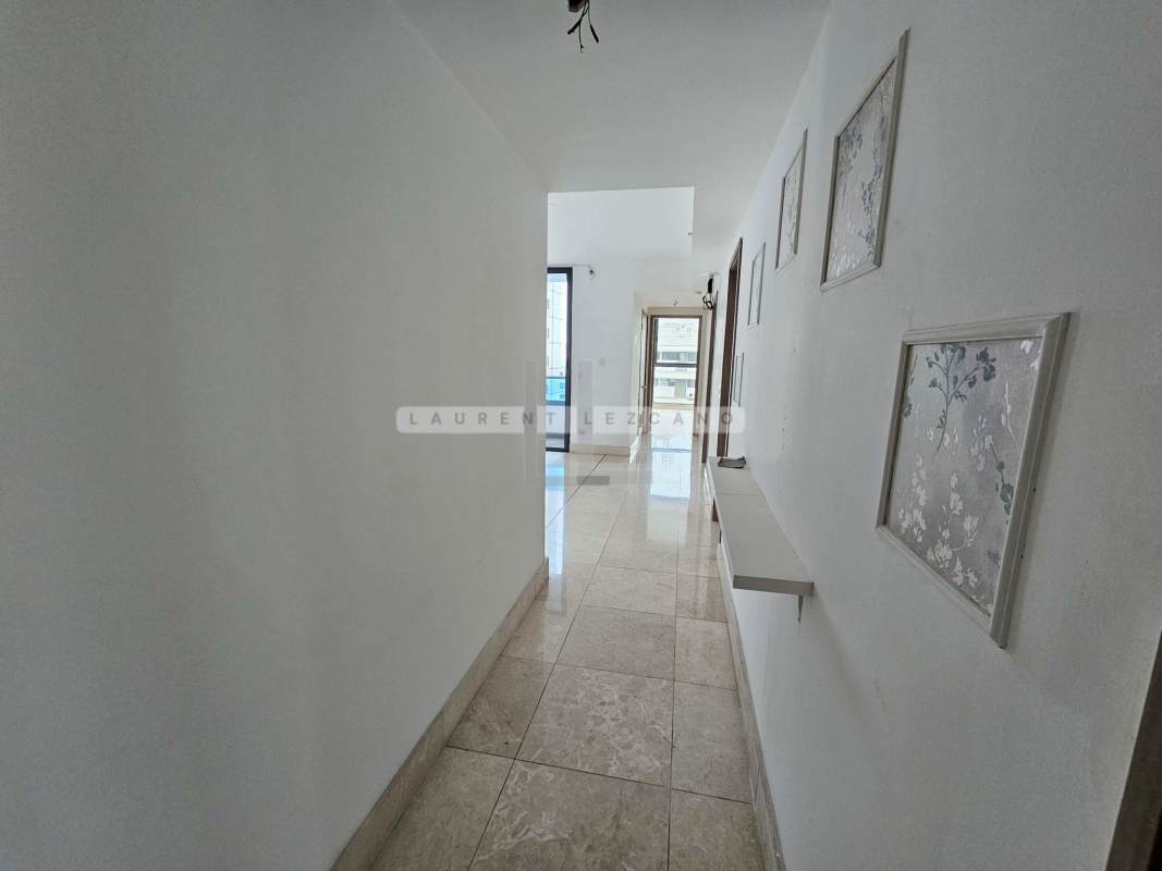 Modern kitchen with granite counters large window in PH Deluxe Residences Punta Paitilla Panama