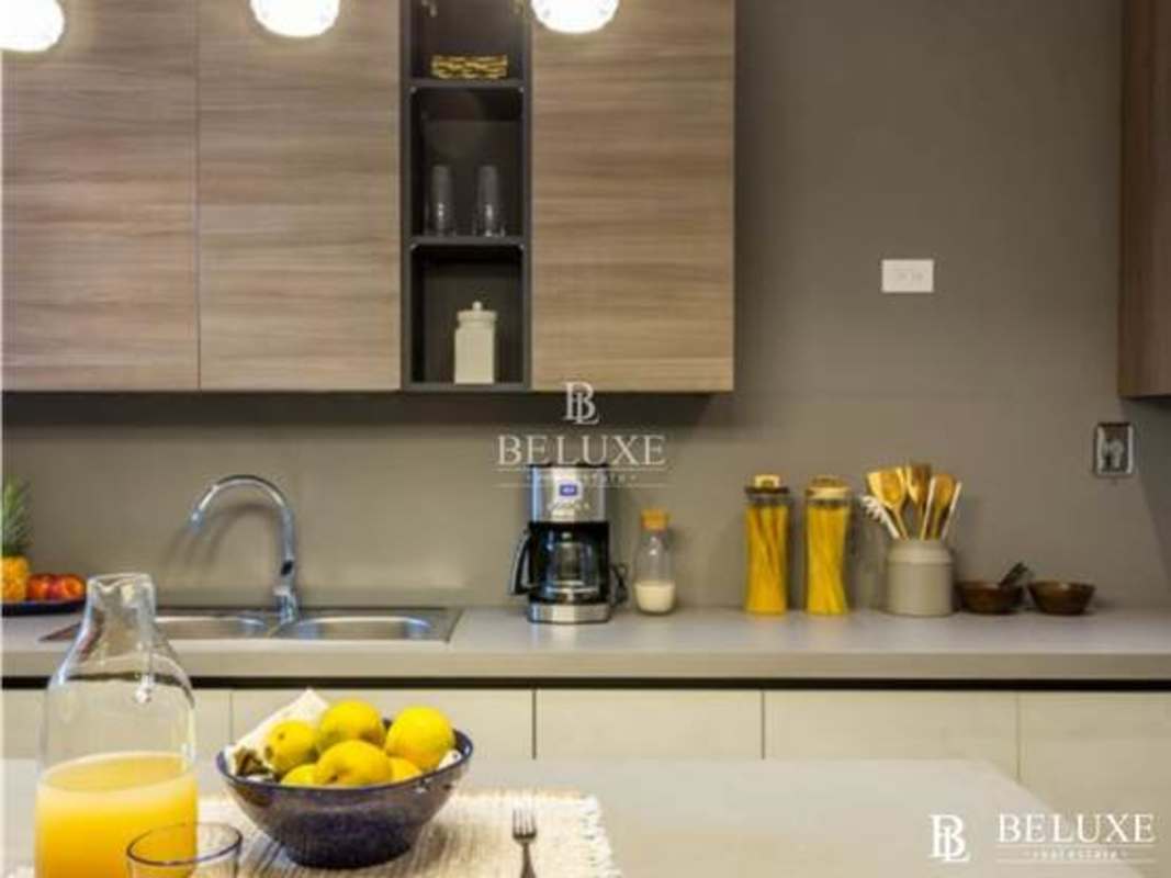 Contemporary kitchen with European cabinets granite countertops PH Ocean Front Punta Paitilla Panama