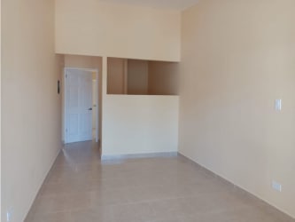 Simple living room space tiled floor economic house Valle de los Cerezos Panama