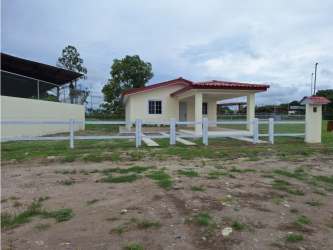 Single story beach house with fenced yard in Santa Clara Panama for sale