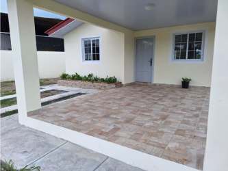 Covered porch tiled entry area of beach house for sale Santa Clara Panama