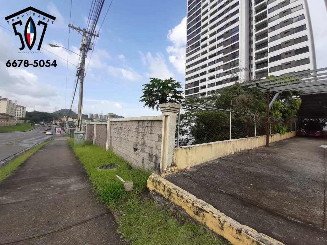 View of neighboring apartment tower adjacent to land for sale in Condado del Rey Panama City