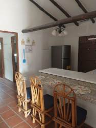 Simple rustic bedroom exposed beams and air conditioning in Coronado vacation rental Panama