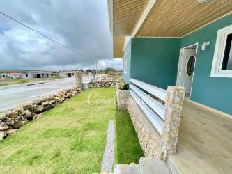Bedroom with private walk-in closet and ceiling fan furnished in Alto Boquete Panama rental house