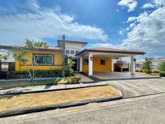 Kitchen with granite countertops wooden cabinets and appliances in Coquito Hills David Panama