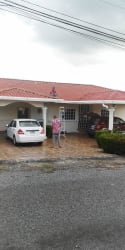 Covered terrace patio with tile floors and outdoor dining set Villa Laura house in San Carlos
