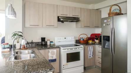 Master bedroom with ensuite bathroom, closet and ocean breezes at Ensenada Beach Resort San Carlos