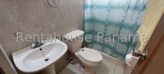 Private backyard with lawn and sliding patio doors La Chorrera Panama Oeste