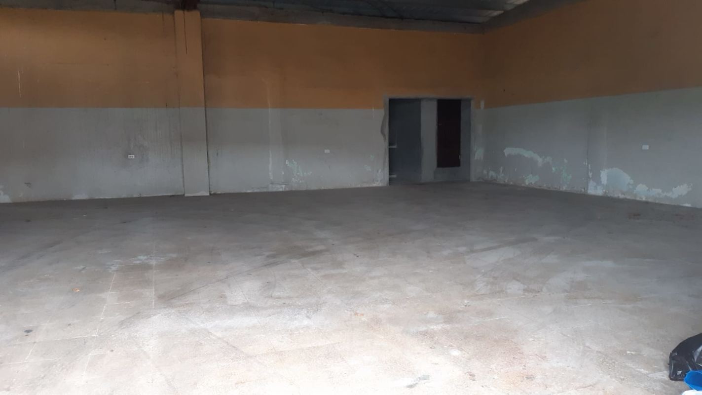 Open industrial warehouse interior with exposed ceiling, concrete floors Pacora Panama
