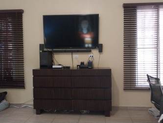 Living room area with TV and entertainment space country home Los Lirios San Carlos