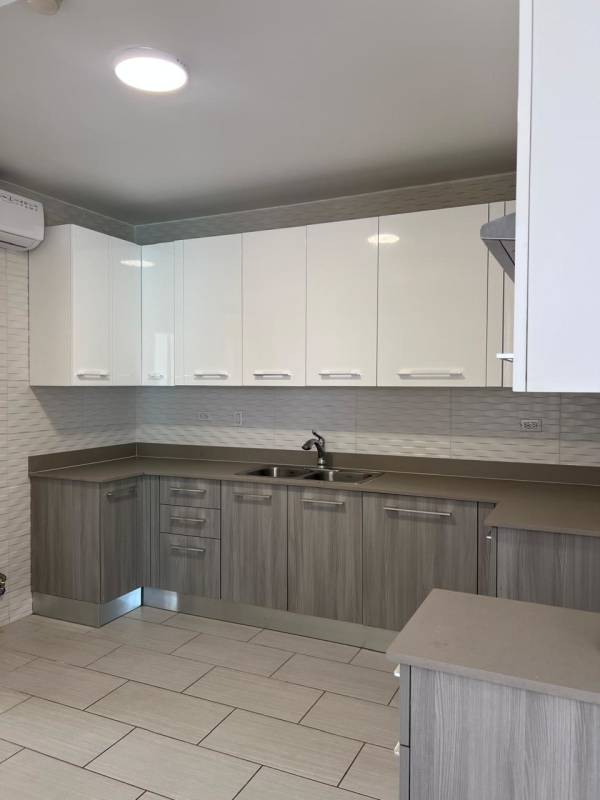 Open living area with large windows and balcony PH The Towers 50th San Francisco Panama