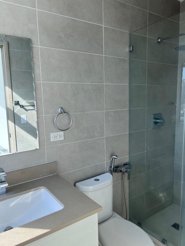 Modern bathroom with glass shower enclosure PH The Towers 50th San Francisco Panama