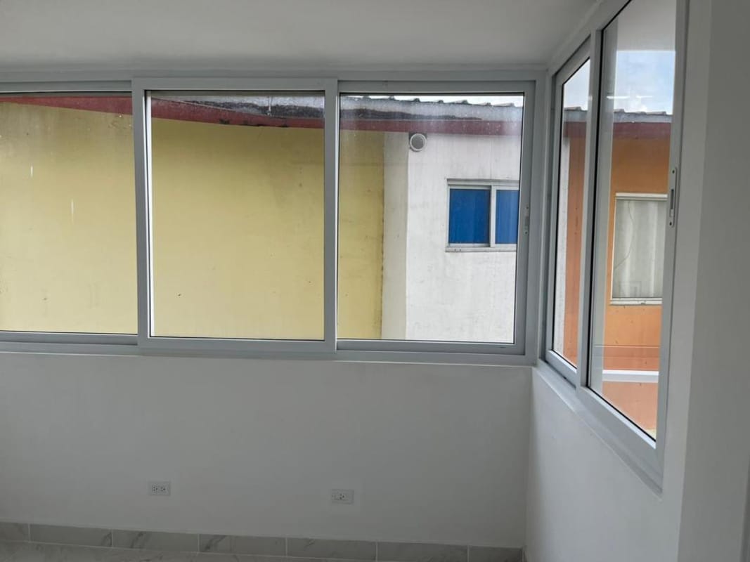 Modern enclosed balcony corner glass windows Mystic Gates Tower 500 Panama