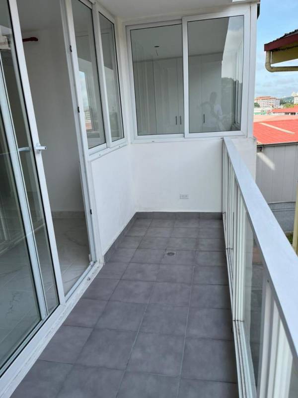 Enclosed balcony area with sliding glass and city views Mystic Gates Panama City
