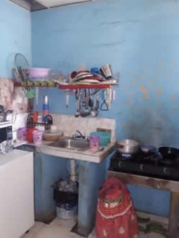 Basic kitchen setup inside existing house on large land parcel in Las Margaritas Panama