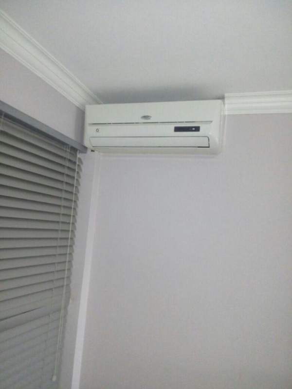 Modern hallway with illuminated shelves wall accent lighting tiled floors in PH Mystic Tower Panama