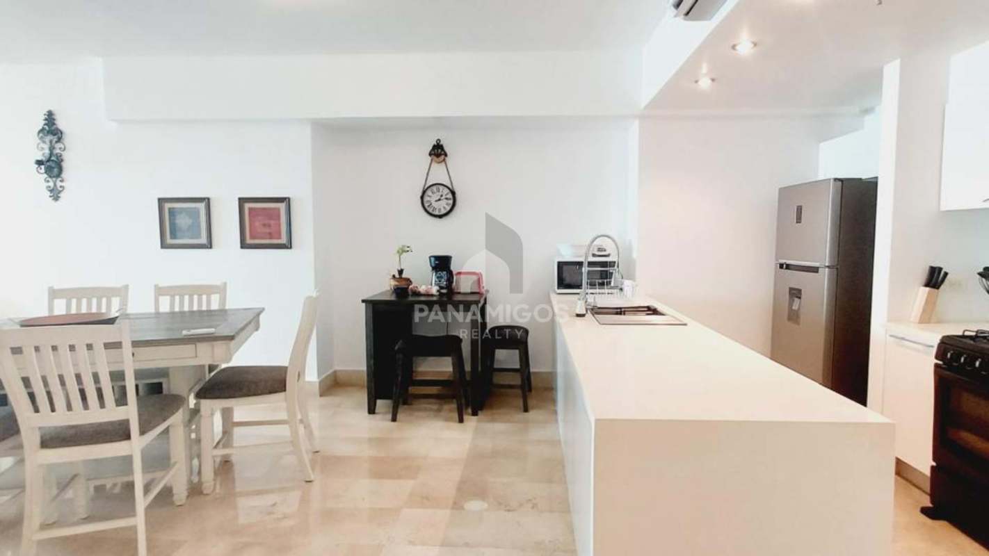 Luxury bedroom with large window, natural light, walk-in closet at PH YOO Avenida Balboa Panama