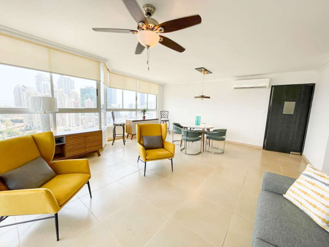 Furnished dining room with modern decor and skyline views in PH Pacific Coast San Francisco Panama