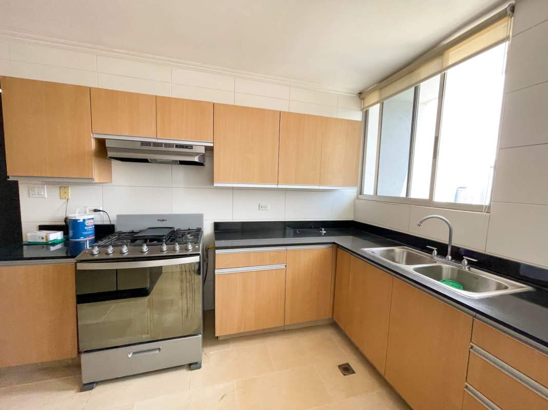 Large furnished primary bedroom with ocean and city views at PH Pacific Coast San Francisco Panama