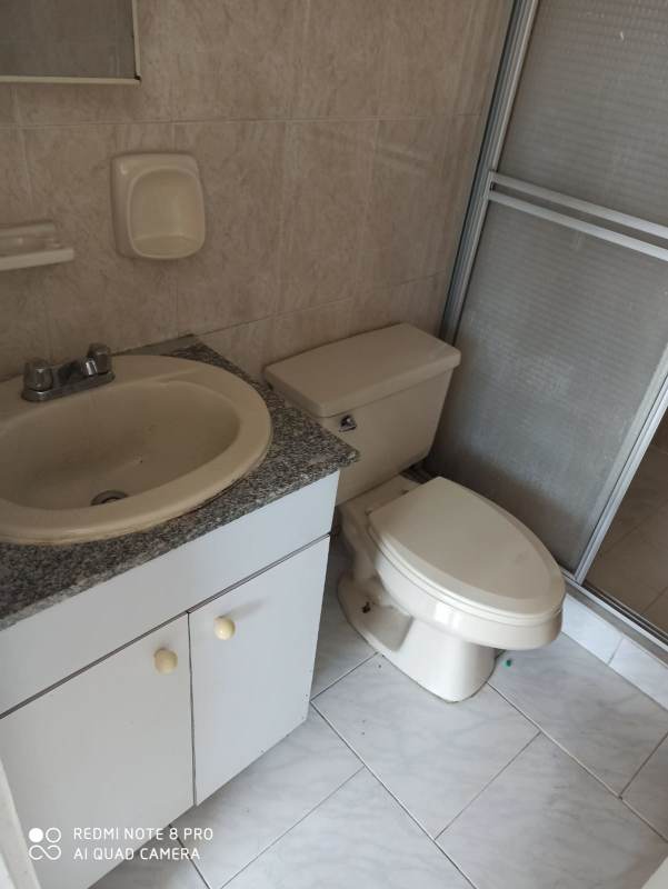 Bathroom granite sink, enclosed shower tiled Edificio La Cresta Panama City