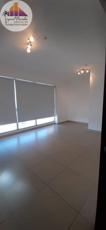 Apartment interior with floor-to-ceiling windows offering panoramic Pacific Ocean views PH BICSA Avenida Balboa Panama