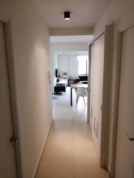 Bright bedroom with garden view window and closet PH River Valley Panama Pacifico