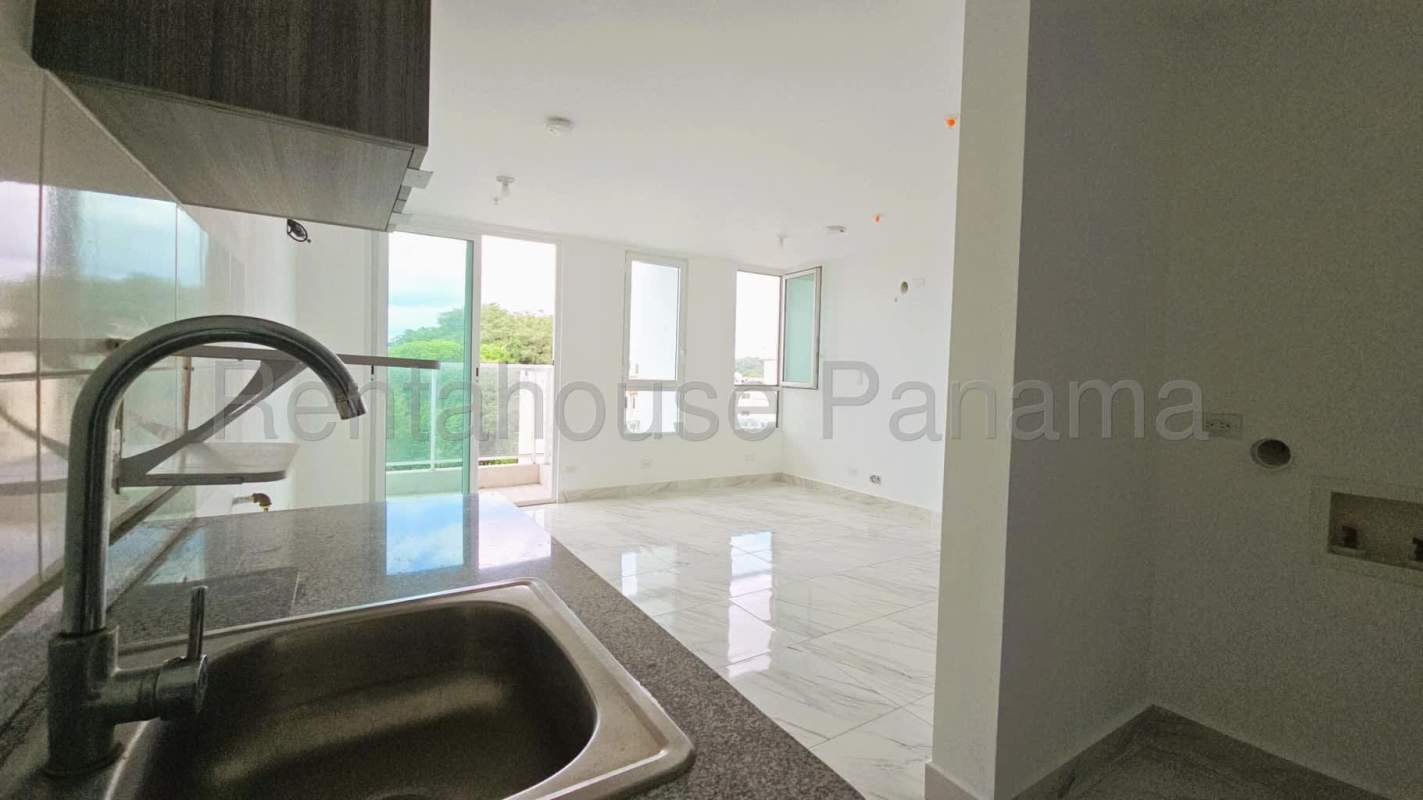 Elegant bathroom with marble tiles and walk-in shower in Bella Vista Panama apartment