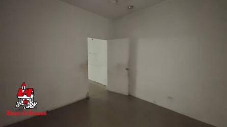 Large shopping mall complex with colorful facade and ample parking in Vista Alegre Arraiján Panama