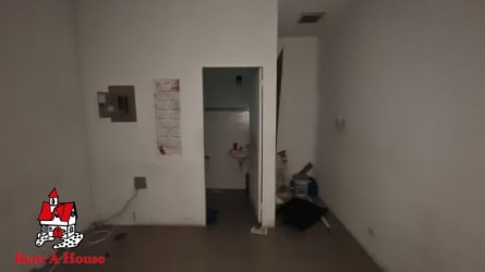 Utility space and private bathroom inside commercial unit Westland Mall Arraiján