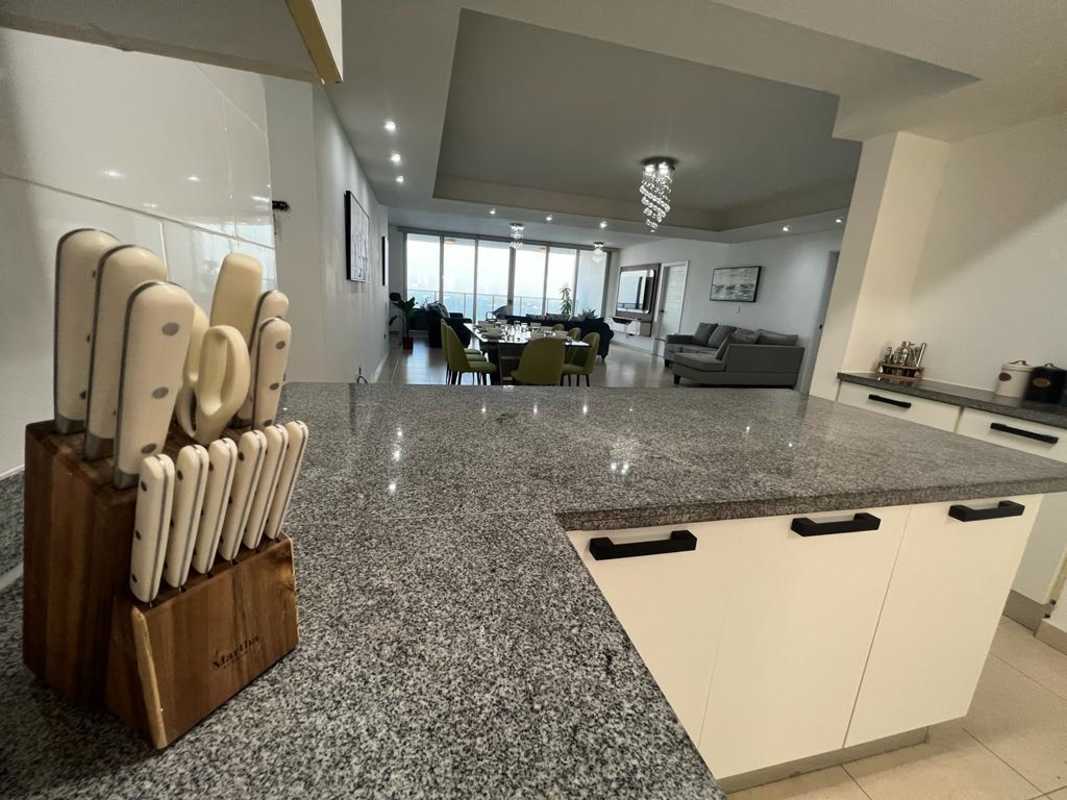 Granite countertop open kitchen in luxury apartment at PH Water on the Bay Marbella Panama