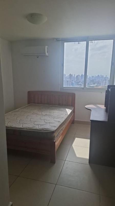 Minimalist bedroom with city view, AC, tile floor PH Kings Park Condado del Rey Panama