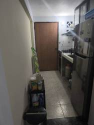 Bedroom striped bedding tile floor affordable apartment David Panama