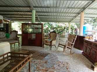 Rustic one-story farmhouse with large lawn and carport near Penonomé Coclé Panama