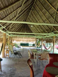 Traditional bohío ranchito with hammocks and seating on country estate near Penonomé Panama