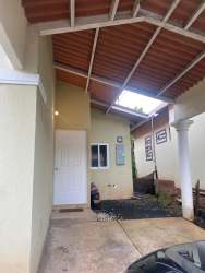 Hallway with tile floor white doors modern ceiling Mystic City La Chorrera