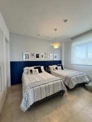 Guest bedroom with natural light and contemporary decor Buenaventura beach apartment