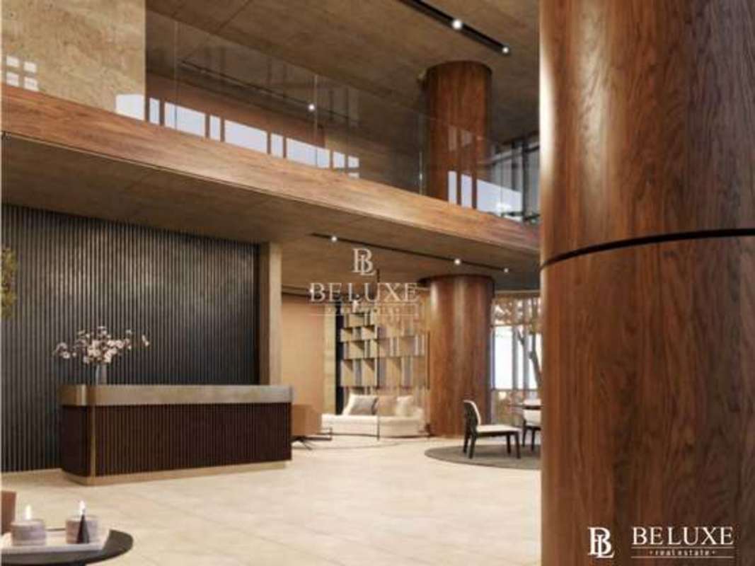 Elegant double-height lobby with designer finishes in PH Madero Costa del Este