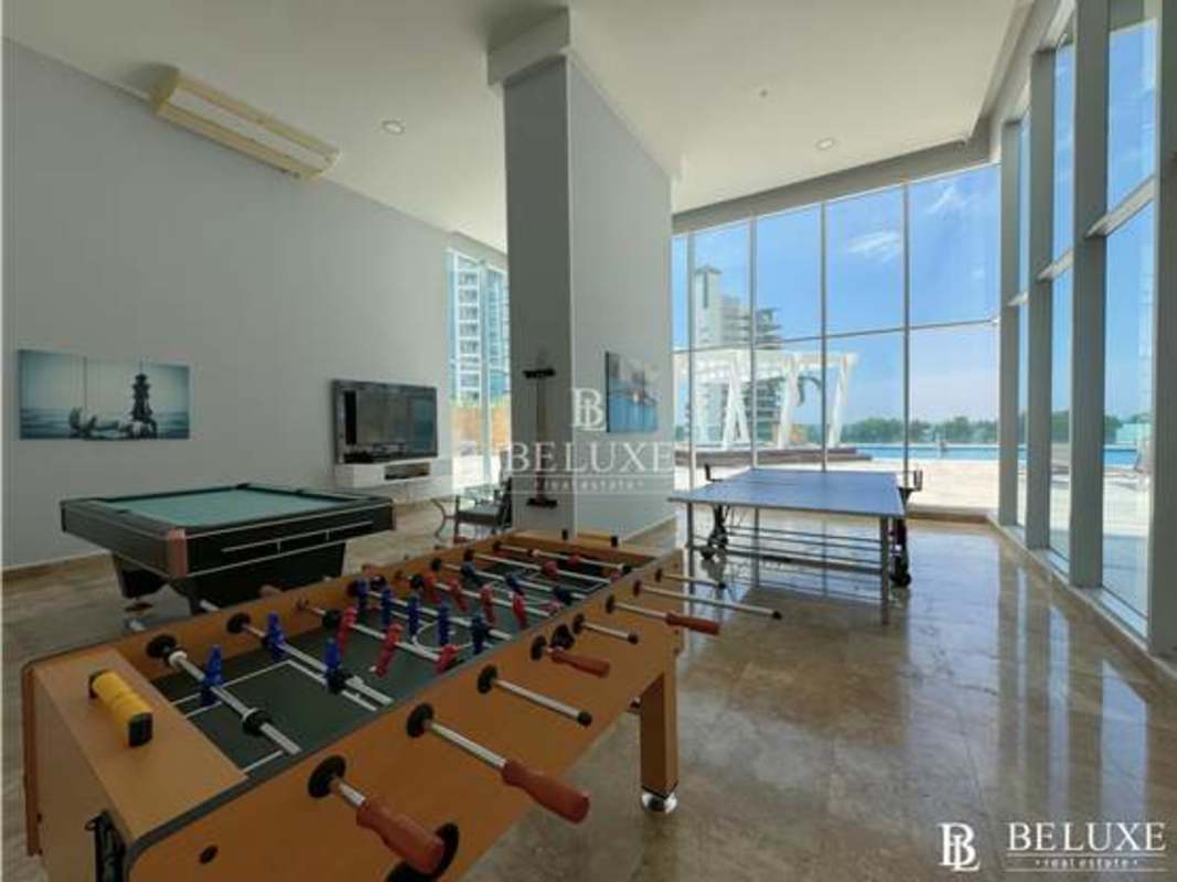 Indoor children's playground with play structures at PH Titanium Costa del Este Panama