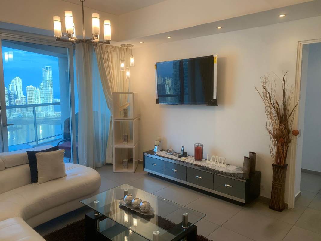 Living room with floor-to-ceiling windows, balcony ocean view PH Yacht Club Tower