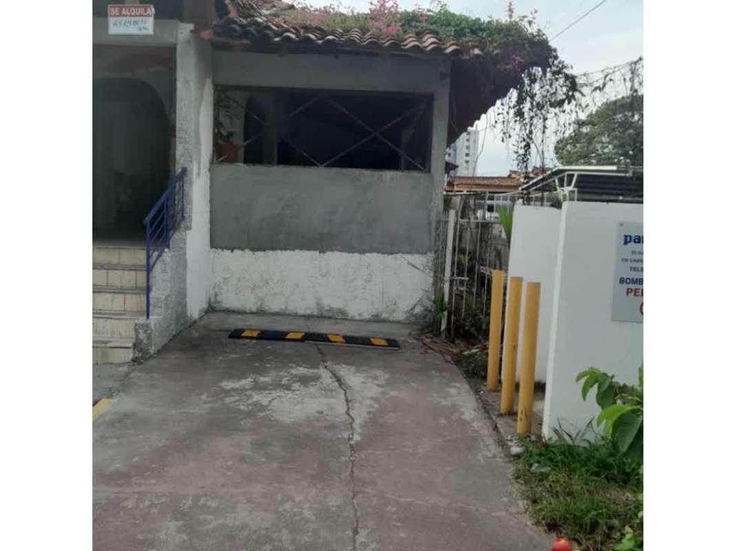 Facade with parking spaces and secure gate on commercial property in Via Porras Panama