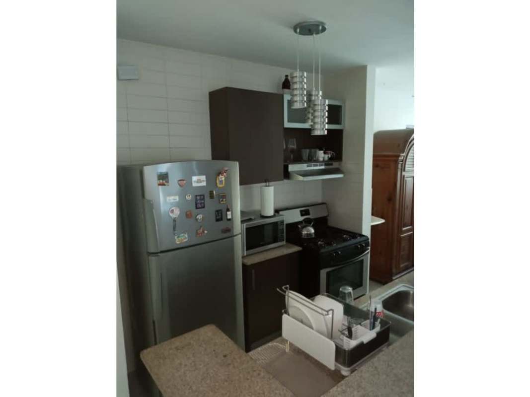 Kitchen with stainless steel appliances granite countertops PH Ocean Club Punta Pacifica Panama