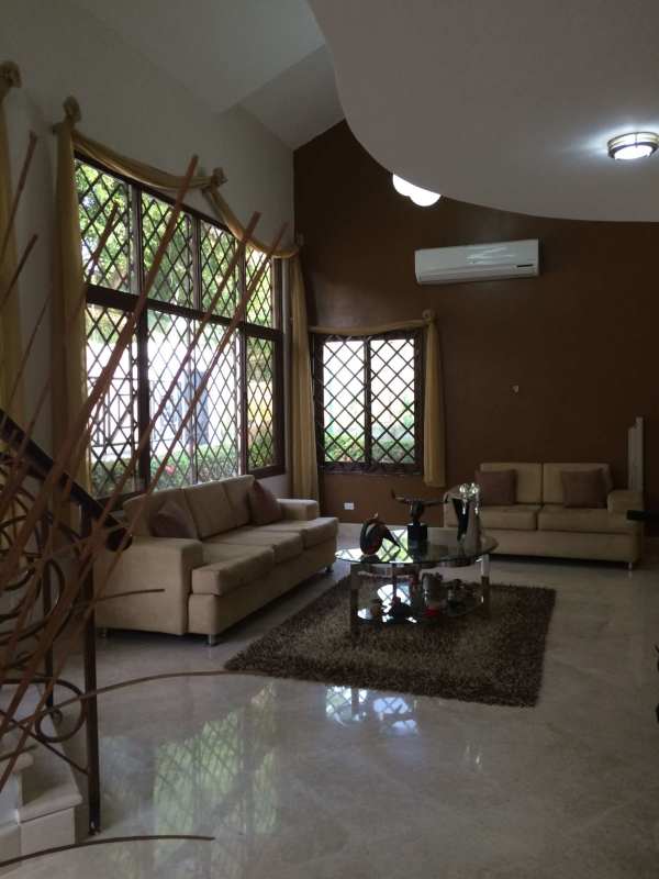 Bright spacious living room with balcony in Albrook luxury house Panama